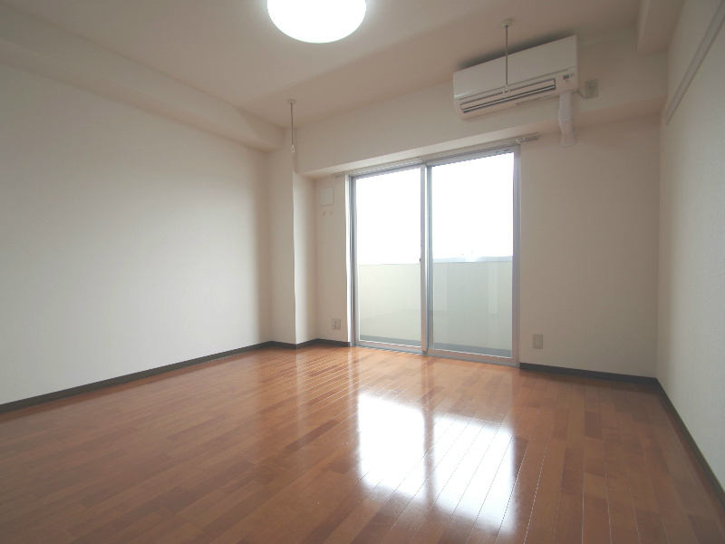 Other room space. It is a photograph of Room No. of different same building. (image)