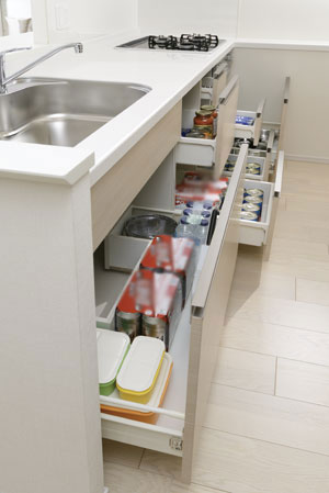 Kitchen.  [Slide storage] Storage of system kitchens, It can be effectively utilized in the prone cabinet in a dead space, It has adopted a sliding storage.
