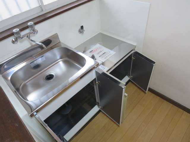 Kitchen. It black shower hose will be the accent color of the bath! 