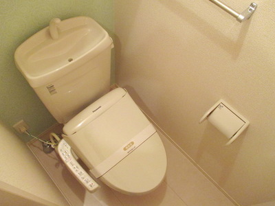 Toilet. Toilet is equipped with Washlet