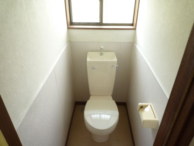 Toilet. Toilet with a window with natural light