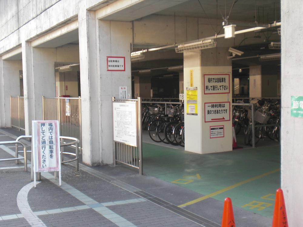 station. Bicycle parking lot of the station. Pay