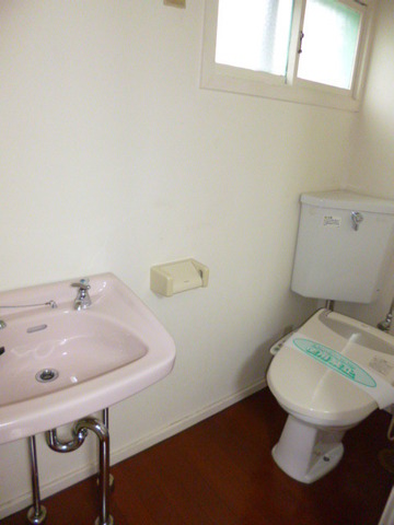 Toilet. It is a toilet in the kitchen. 