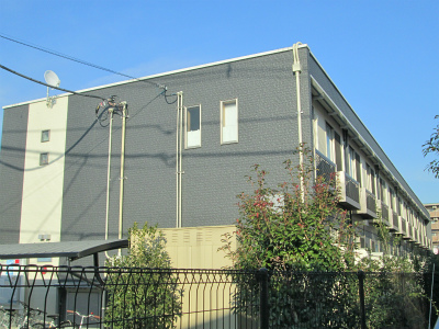 Building appearance. It is east of the property. 