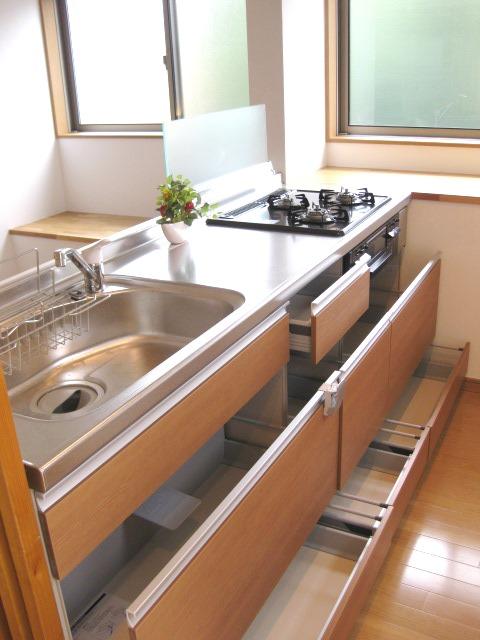 Kitchen. Bay windows also the installed storage preeminent bright face-to-face kitchen