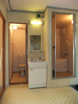 Toilet. Bus toilet by! Independent wash basin! (It is a photograph of another room)