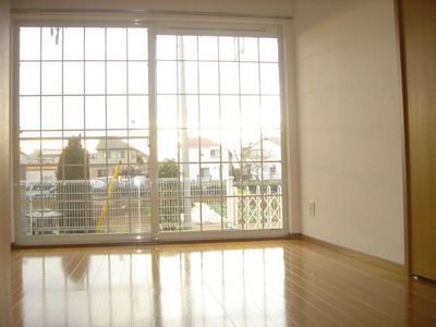 Living and room. Large window is characterized by