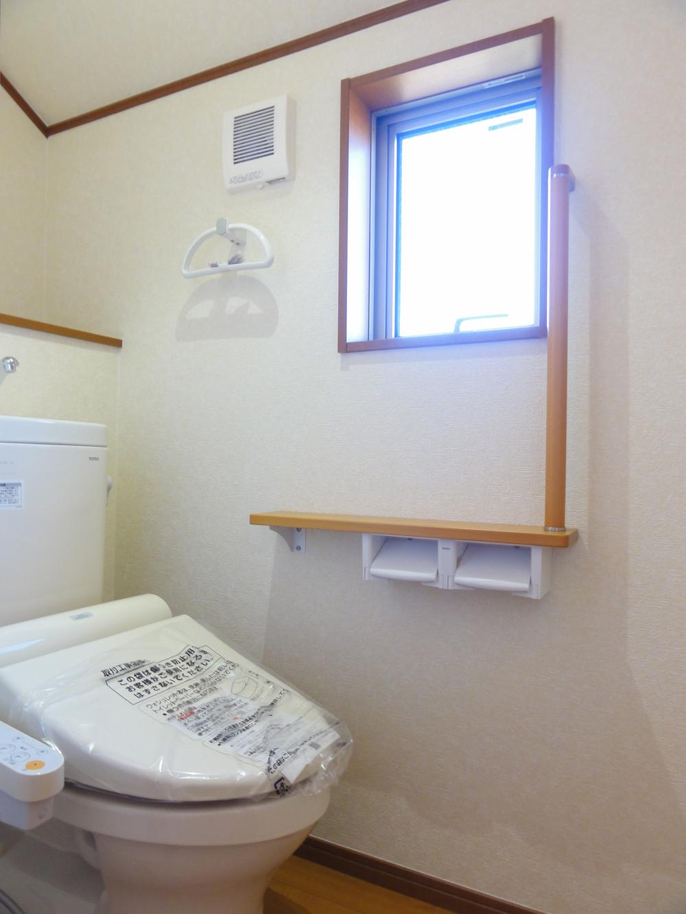 Toilet. Handrail toilet