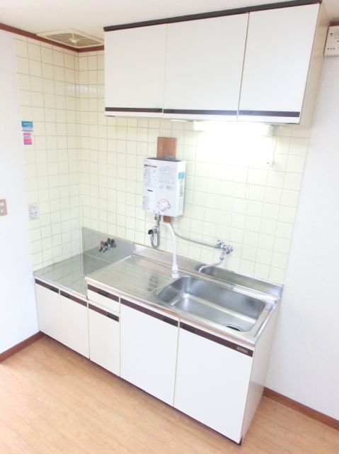 Kitchen. Two-burner gas stove can be installed kitchen. There is space put a cutting board