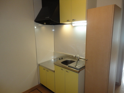 Kitchen. Abundant storage with a hanging cupboard! ! 