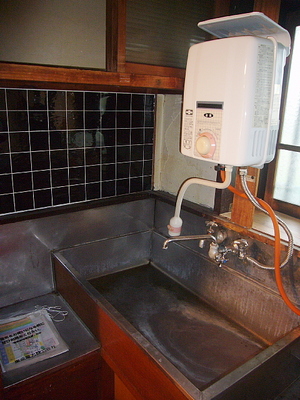 Kitchen. With water heater