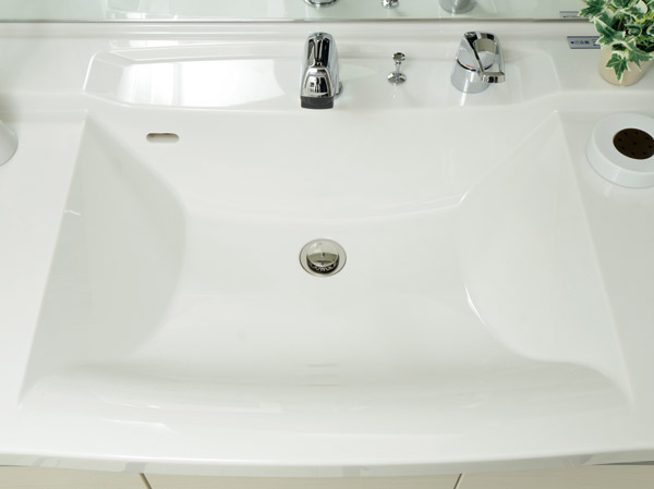 Bathing-wash room.  [Bowl-integrated counter] The vanity of man-made marble, Use of the counter-integrated Square bowl. It is easy to clean because there is no seam.