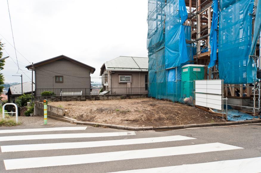 Local photos, including front road. Corner lot, South terraced sun per well per