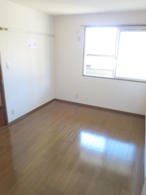Other room space. It is muted colors of the room
