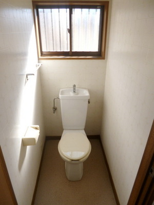 Toilet. There is a window in the toilet