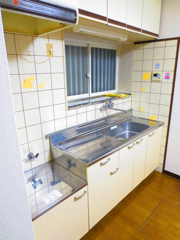 Kitchen. It is around the bright kitchen there is a window