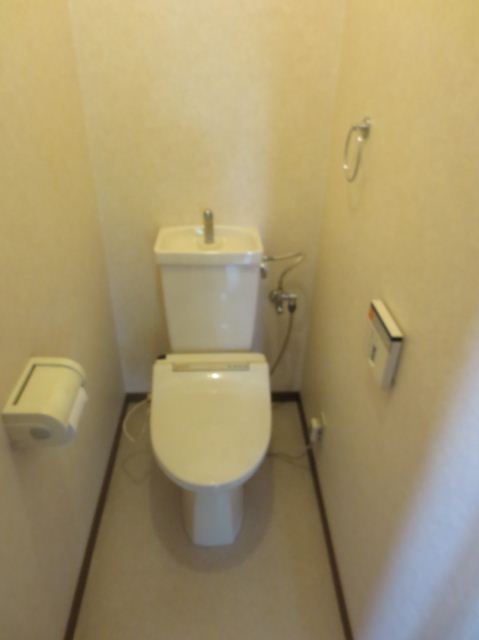 Toilet. Bus toilet by Western-style toilet