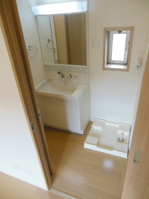 Washroom. It comes with a dressing room space small window