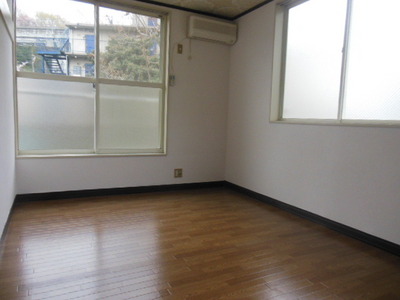 Living and room. It is a photograph of the corner room is actually a middle room