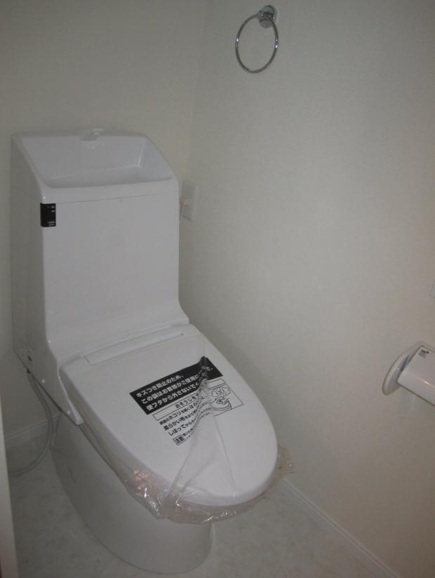 Toilet. It is the bidet toilet wall with remote control.