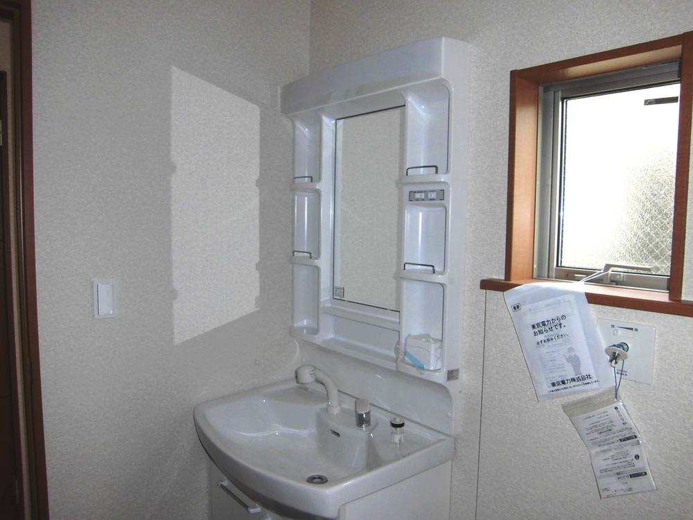 Wash basin, toilet. The photograph is an example of construction Shower booth