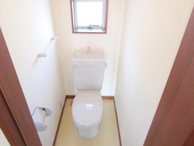 Toilet. There is a window in the toilet