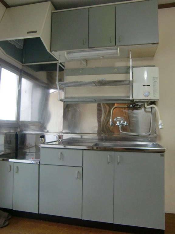 Kitchen. Kitchen with a small window. Two-burner gas stove installation Allowed. 