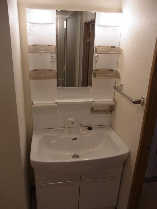 Wash basin, toilet. Shampoo dresser is a new article.