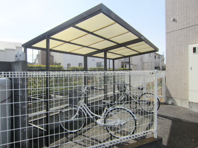 Security. It is a roof with bicycle parking