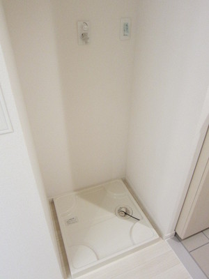 Other Equipment. Washing machine put in a room