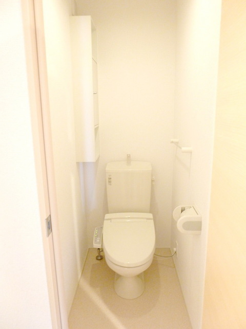 Toilet. Toilet is equipped with Washlet