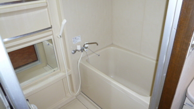 Bath. There is also a storage with a mirror