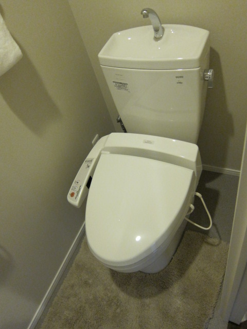 Toilet. ● Warm water washing toilet seat