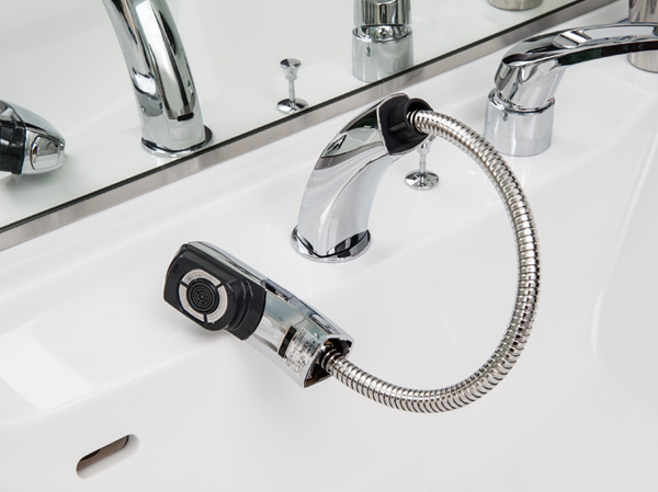 Bathing-wash room.  [Lift-up shower faucet] Convenient lift-up of the shower faucet to such as water Kumi. Since the draw is head, You come in handy, such as the cleaning of the bowl.