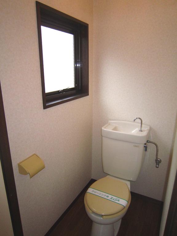 Toilet. There is also a window to the toilet