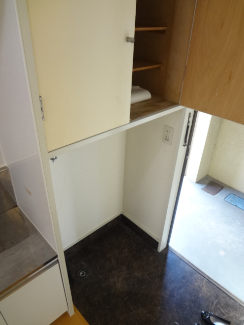 Other room space. There is housed in a washing machine storage top