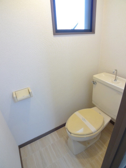 Toilet. There is a window in the toilet ventilation good