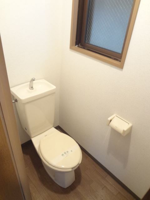 Toilet. Window there of restroom. Good ventilation