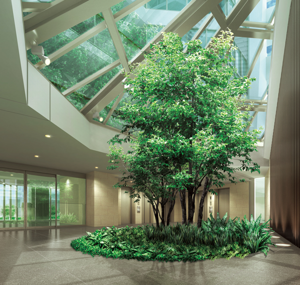 Buildings and facilities. Greet Benjamin symbol tree fresh green leaves grow thick, Elevator hall that incorporate natural light (Rendering). Space covered with large roof of transparency reminiscent of a hotel lounge is directing the moisture by natural light and green.  ※ Trees such as the on-site is what drew the image of the location after you've grown. Shades of leaves and flowers, Tree form, etc. is slightly different actual and.