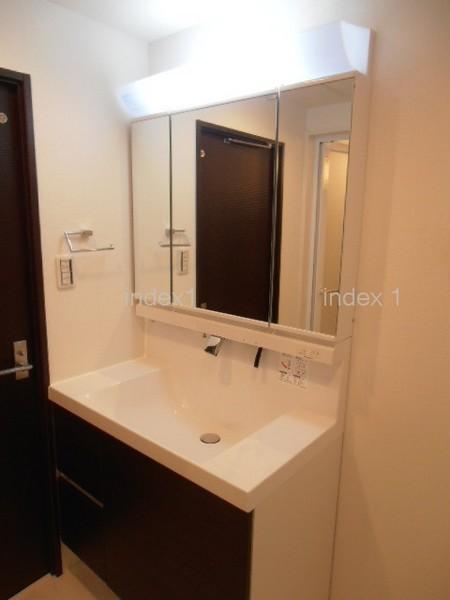 Wash basin, toilet. Washbasin glad shower in a busy morning