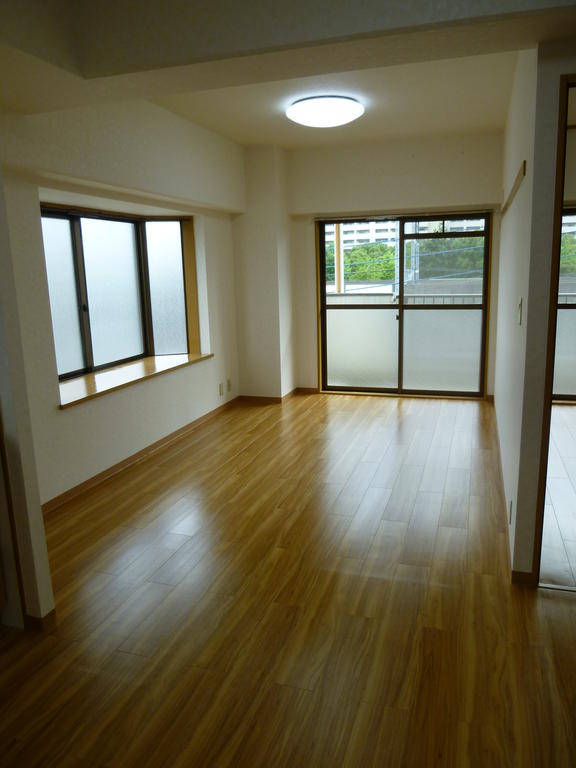 Living and room. It is a south-facing balcony