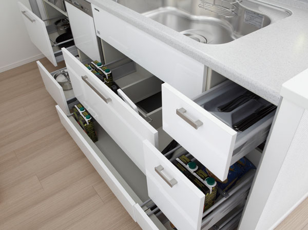 Kitchen.  [Sliding storage] Storage of system kitchens, It can be effectively utilized in the prone cabinet in a dead space, Sliding storage has been adopted.  ※ The top hanging cupboard is excluded