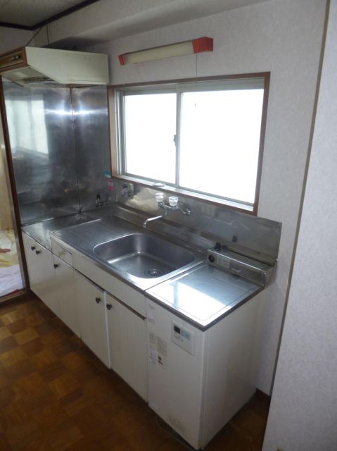 Kitchen. There is also a window with a large sink! 