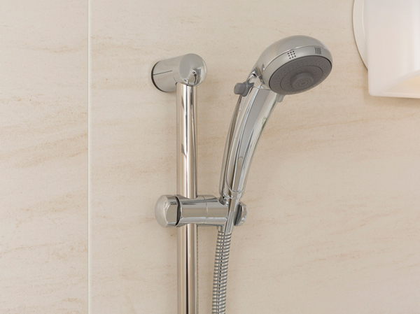 Bathing-wash room.  [One-stop shower head] Temporarily equipped with a water-saving functions that can stop the water at hand of a button, It comes with a slide bar that can change the height to use.