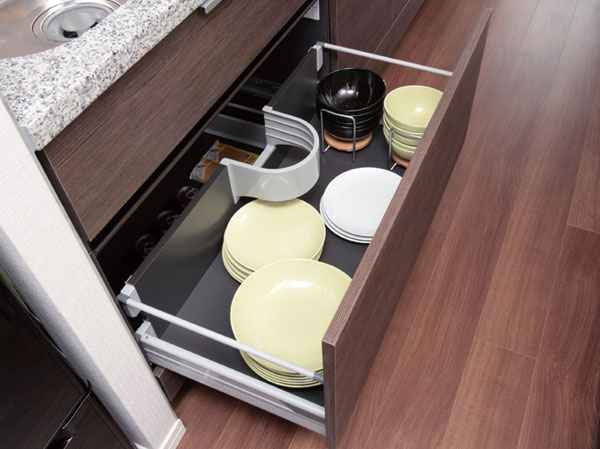 Kitchen.  [All slide cabinet] Tabletop cookware troubled in place, such as a hot plate or portable gas stove also enter refreshing to sink under.