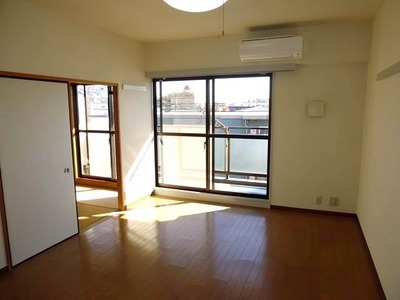 Living and room. South side of the living room (flooring, Air condition) and a Japanese-style room