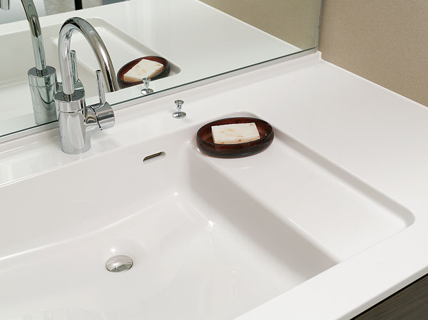 Bathing-wash room.  [Lavatory bowl] Counter and bowl in the integrally molded with no easy seam of care, Beautiful luster artificial marble. A bowl of linear square form, It will produce the urban basin space. (Same specifications)