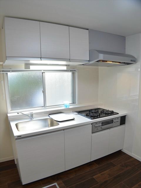 Kitchen. Bright kitchen with large windows