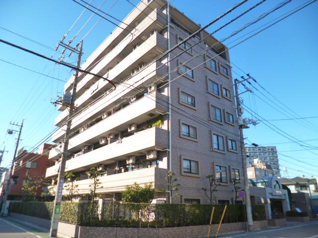 Local appearance photo. 1994 architecture ・ Tile is pasted auto-lock of the property