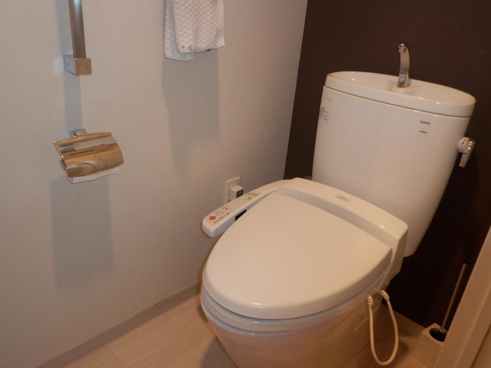 Toilet. Indoor (10 May 2013) Shooting. Easy to clean, Borderless tornado toilet. It is safe design the auxiliary handrail is with.